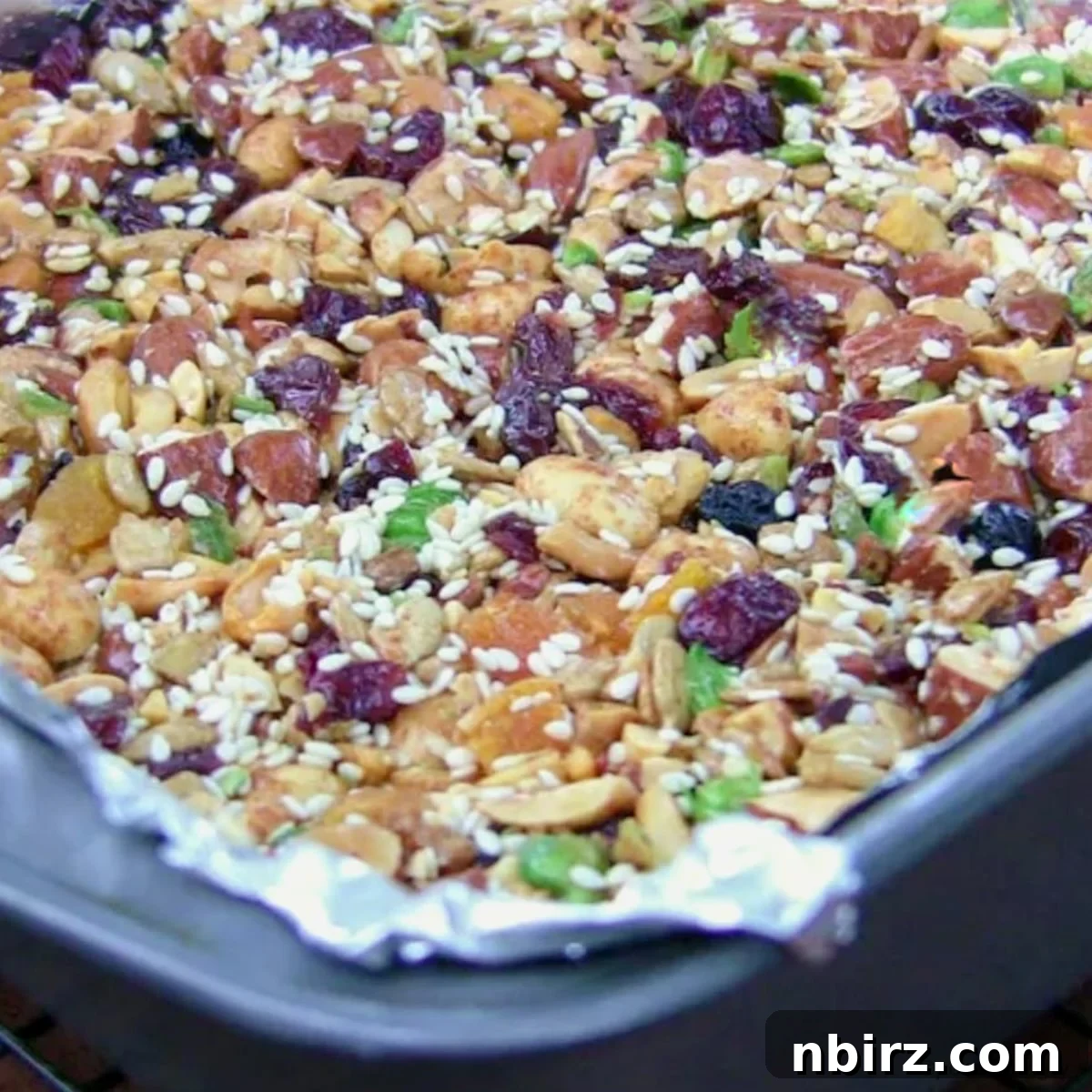 Homemade KIND Bars: A 4-Ingredient Delight 3 Uncut DIY KIND bars in a baking pan