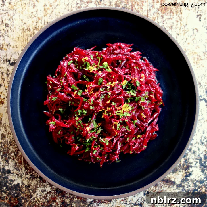 overhead shot of fresh beet salad on a slate plate
