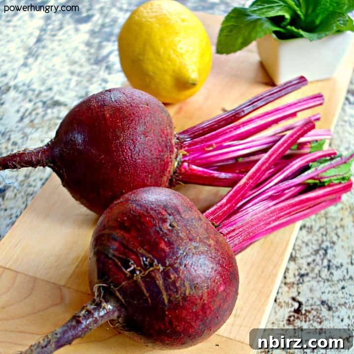 ingredients for fresh beet salad n a wooden cutting board