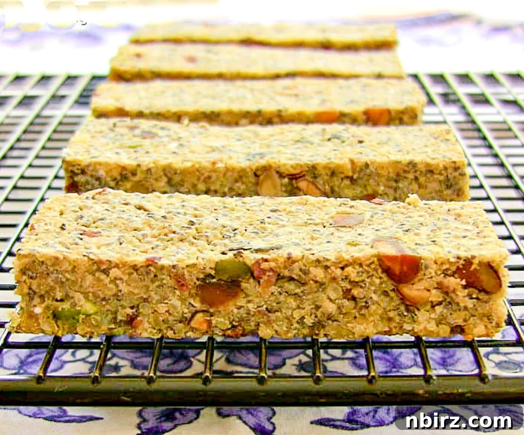 Guilt-Free Savory Vegan Energy Bars 2 Delicious homemade vegan savory power bars cooling on a black metal rack, ready to be enjoyed.