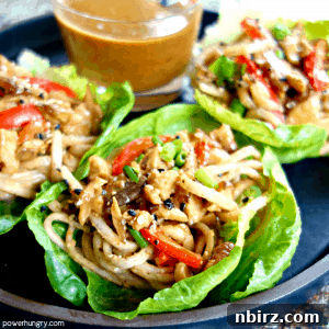 A delightful plate of Sesame Ginger Soba Lettuce Cups, showcasing their vibrant appearance and readiness to be savored.