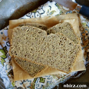 Vegan Gluten Free Oil Free Chickpea Flax Sandwich Bread 2 overhead shot of slices of chickpea flour flax bread in a pie tin atop a colorful napkin