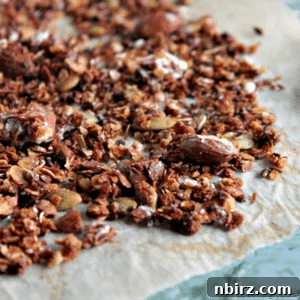 oil-free chocolate granola on a piece of baking parchment