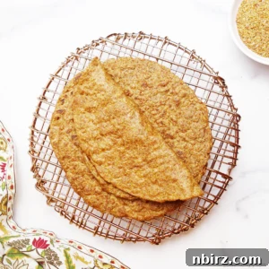 Effortless Keto Flaxseed Wraps 11 Overhead shot of flax tortillas on a copper wire rack