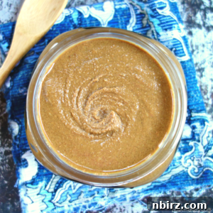 Overhead shot of sunflower butter in a jar with a rating of 5 stars from 17 votes