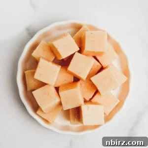 Red Lentil Tofu The One Ingredient Soy Free Sensation 4 white dish filled with cubes of red lentil tofu