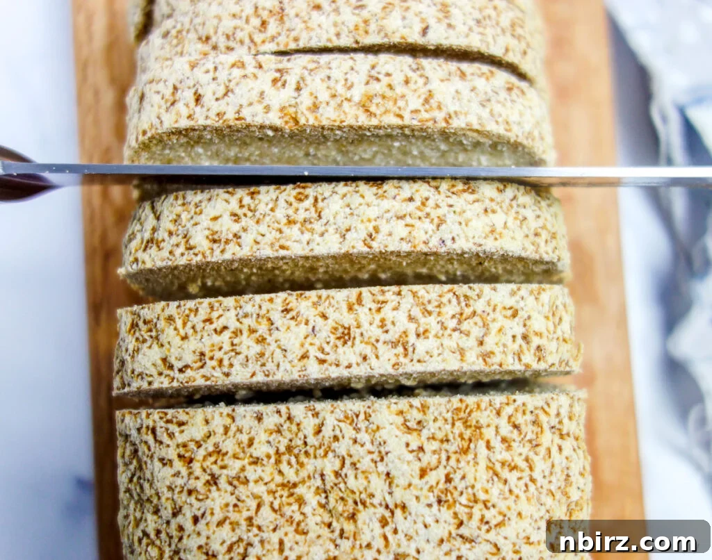 A close-up view of freshly sliced bread, showcasing its texture and ready for various uses.