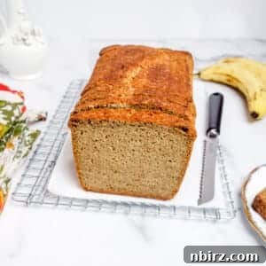 millet banana bread with a colorful napkin and a cutting knife alongside