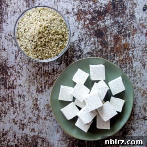 overhead shot of hemp heart tofu on a distressed metal background