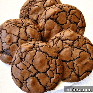 vegan and gluten-free double chocolate cookies on a white plate
