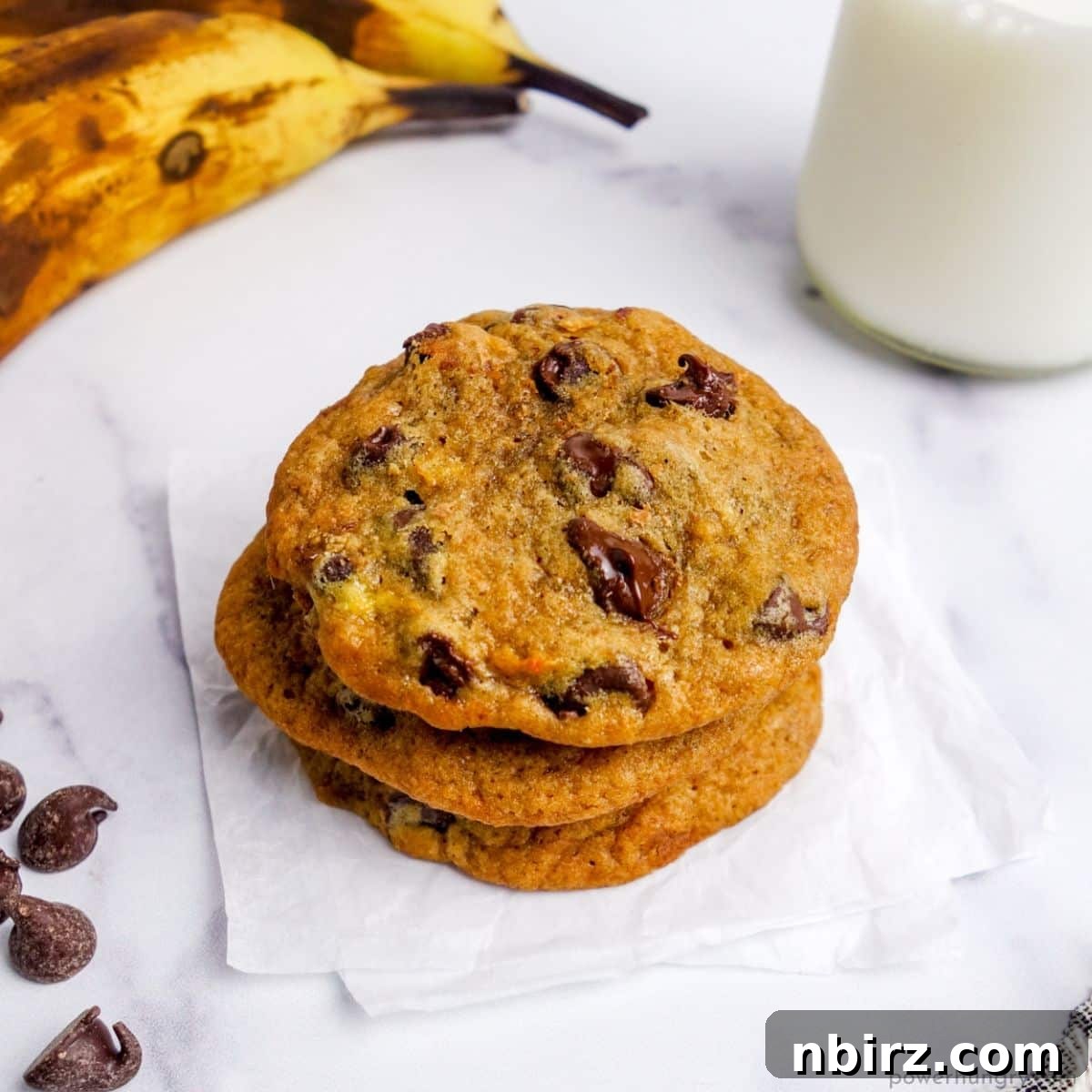 a stack of banana chocolate chip cookies