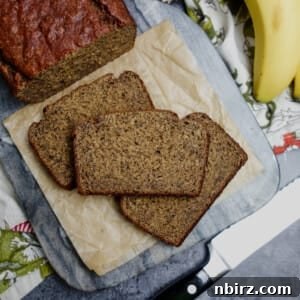 slices of banana bread on a wood cutting board