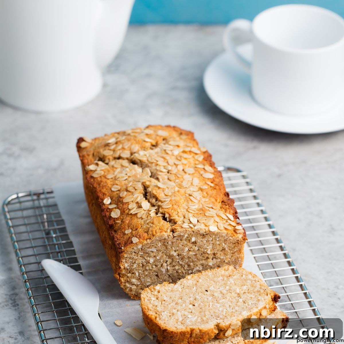 Fluffy Gluten-Free Garbanzo Oat Bread (Yeast & Oil-Free) 4 Slices of chickpea flour oat bread arranged on a plate, ready for serving.