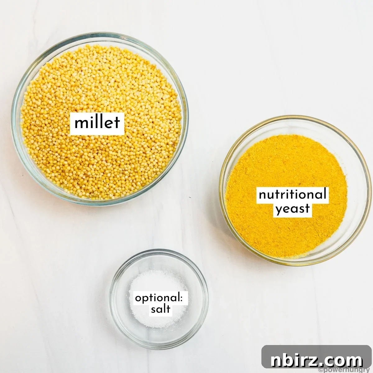 Protein-Packed Millet Nuggets: Just Two Ingredients 4 Individual glass bowls containing the main ingredients for millet nuggets: millet and nutritional yeast