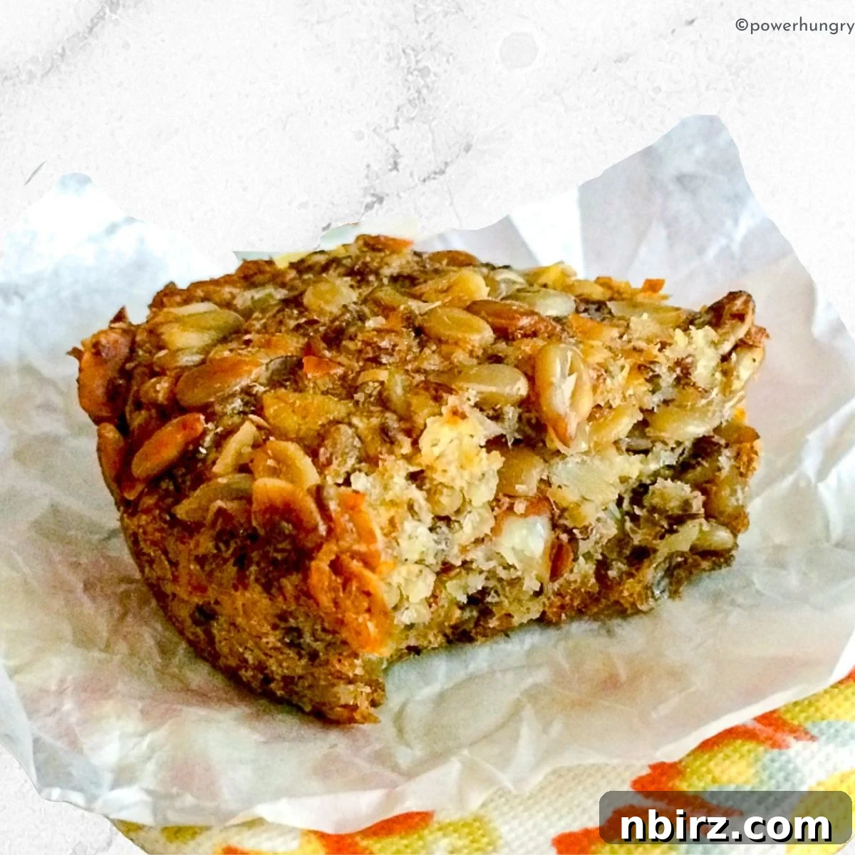 seeded oat protein bread with bite taken out