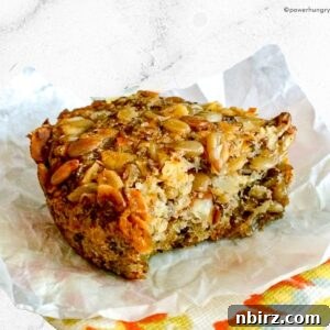 seeded oat protein bread with bite taken out