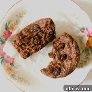 high protein teff raisin bread, split, on a china plate