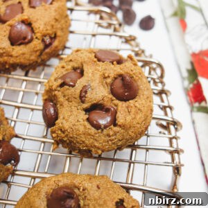 chocolate chip flax cookies on a copper cooling rack