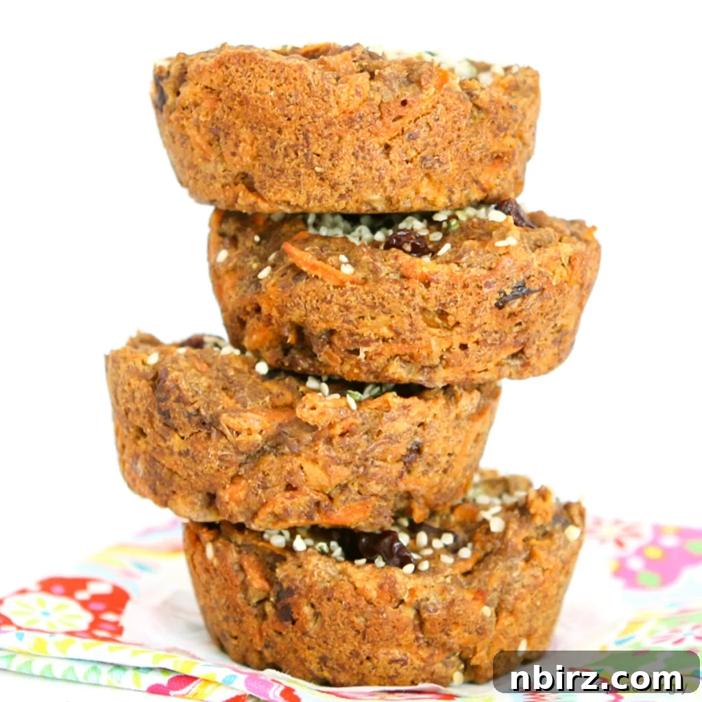 Delightful Vegan Carrot Cake Breakfast Cookies Gluten Free Oil Free 2 Stack of vegan carrot cake breakfast cookies on a colorful napkin, showcasing their inviting texture