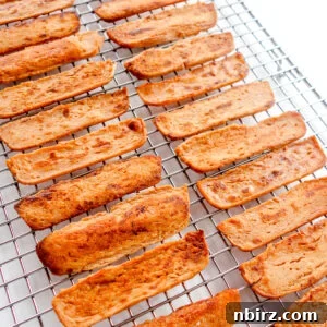 Crispy lentil bacon on a cooling rack, ready to be served or stored.
