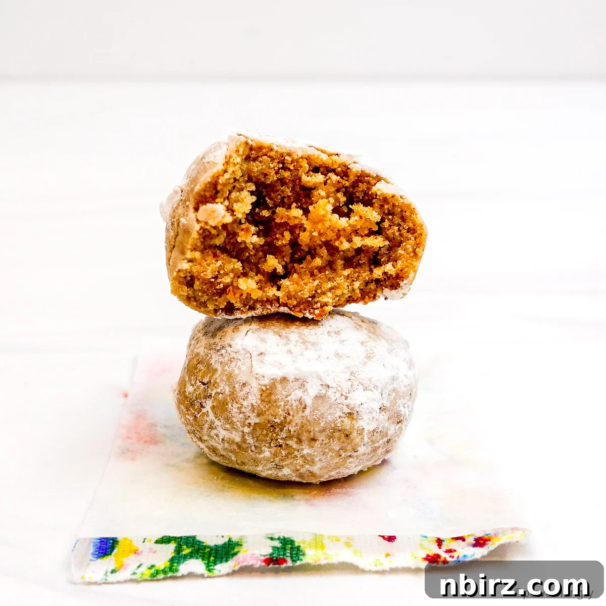 The Perfect Grain-Free Vegan Wedding Cookie 3 Two wedding cookies stacked on top of each other