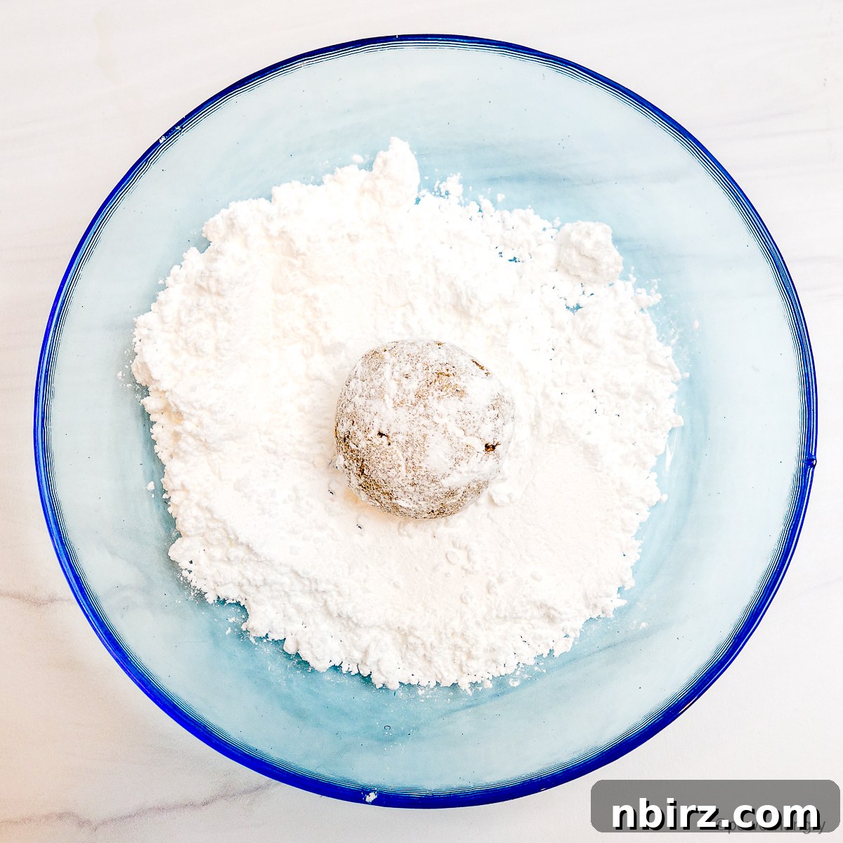 The Perfect Grain-Free Vegan Wedding Cookie 6 Coconut cookie in powdered sugar
