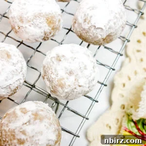The Perfect Grain-Free Vegan Wedding Cookie 10 vegan coconut flour wedding cookies on a cooling rack