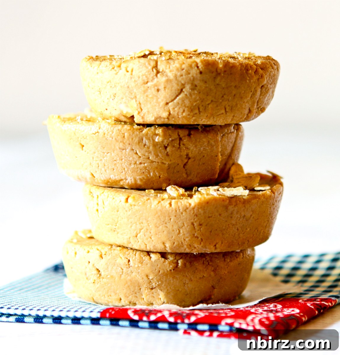 No Bake Vegan Gluten Free Apple Protein Bars 3 A stack of four perfectly crafted apple protein bars, ready to be enjoyed