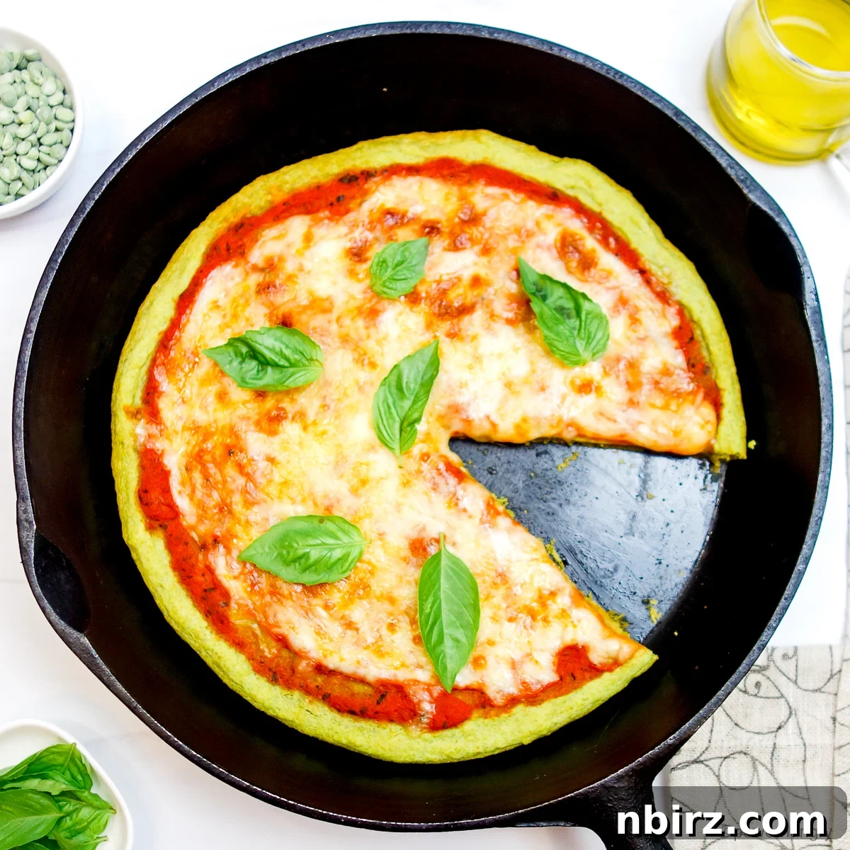 Quick Protein Packed Split Pea Pizza Crust 11 Close-up of a perfectly baked split pea pizza crust with a slice removed, showing its sturdy yet tender texture