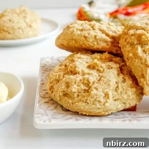 Effortless 4-Ingredient Millet Biscuits: Gluten-Free & Vegan Delight 10 millet biscuits on a white plate