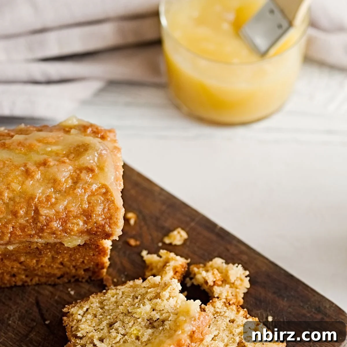 Healthy Oil Free Gluten Free Applesauce Oatmeal Bread 6 Close-up of oat flour applesauce bread on a wooden board