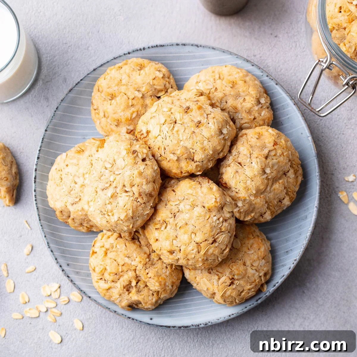 No-Fuss Almond Butter Oat Cookies 2 Close-up of a stack of golden brown almond butter oat flour cookies
