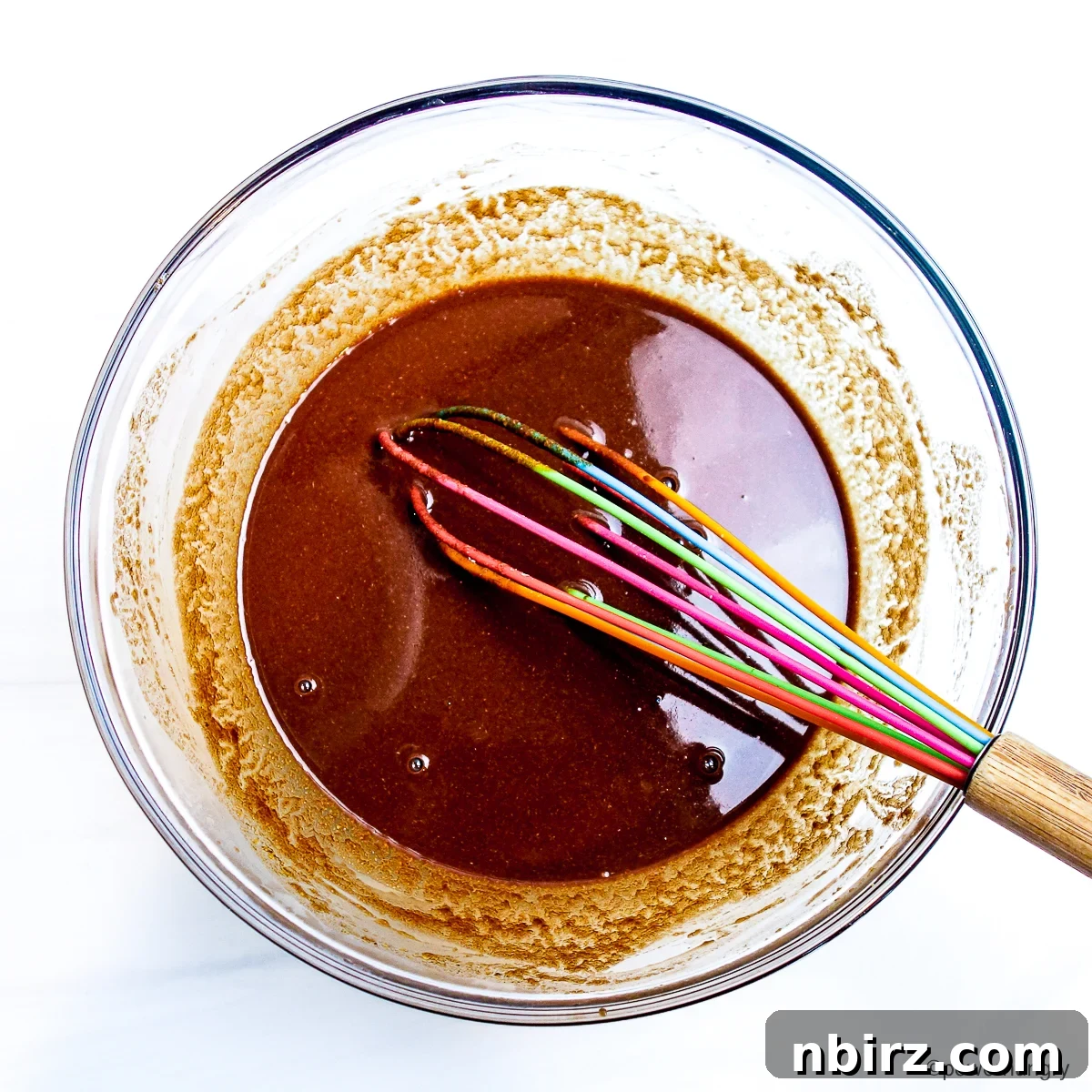 Decadent Vegan Gluten Free Chocolate Peanut Butter Chickpea Cookies 5 Wet ingredients for chocolate chickpea flour cookies blended smoothly in a glass bowl