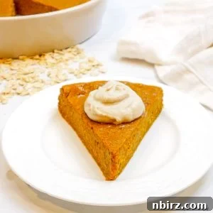impossibly easy vegan oat pumpkin pie slice on a white plate