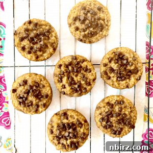 overhead shot of vegan chocolate chip banana quinoa muffins on a wire cooling rack