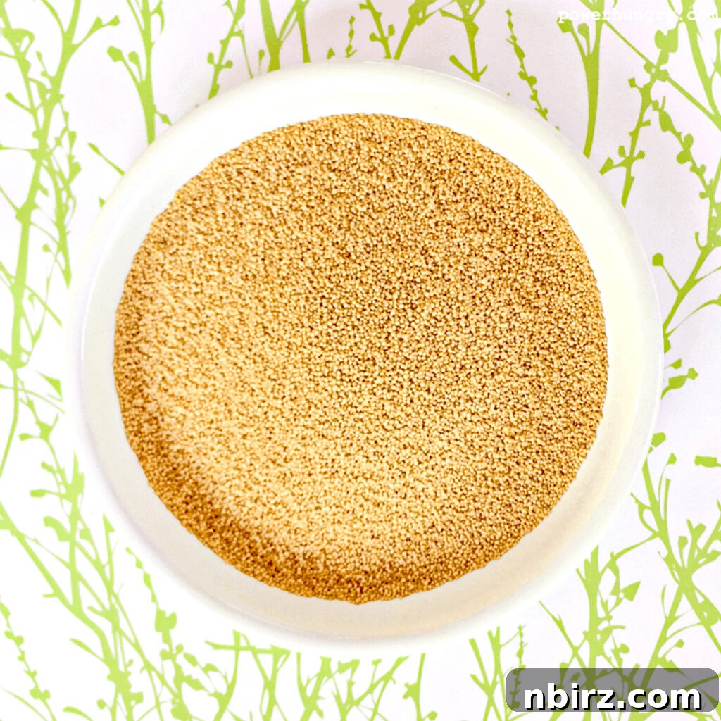 Wholesome Vegan Amaranth Protein Muffins 3 White bowl filled with raw amaranth grains, ready for cooking and baking