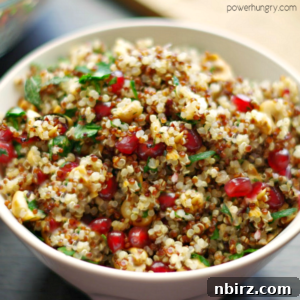 white bowl filled with apple quinoa salad