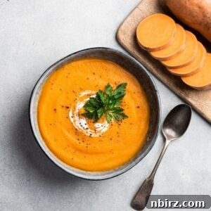 Quick Protein Boost Sweet Potato Soup Only Three Ingredients 5 A vibrant bowl of 3-ingredient sweet potato soup, garnished and ready to serve.