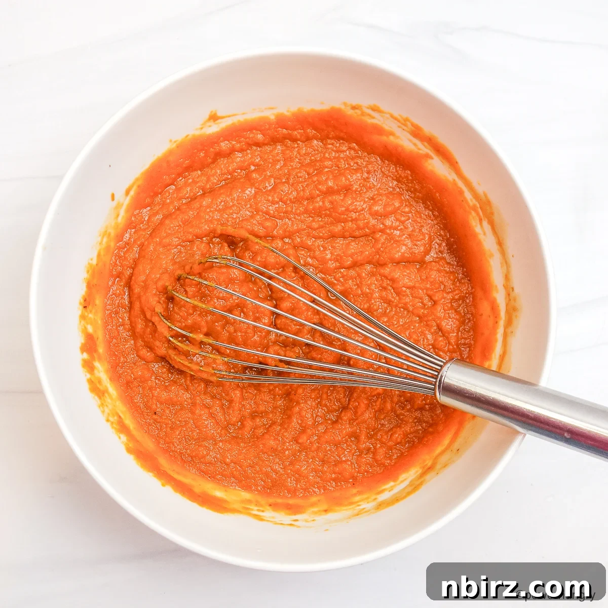 TVP Pumpkin Protein Bars: A Naturally Boosted Treat 5 Pumpkin and maple syrup in a bowl
