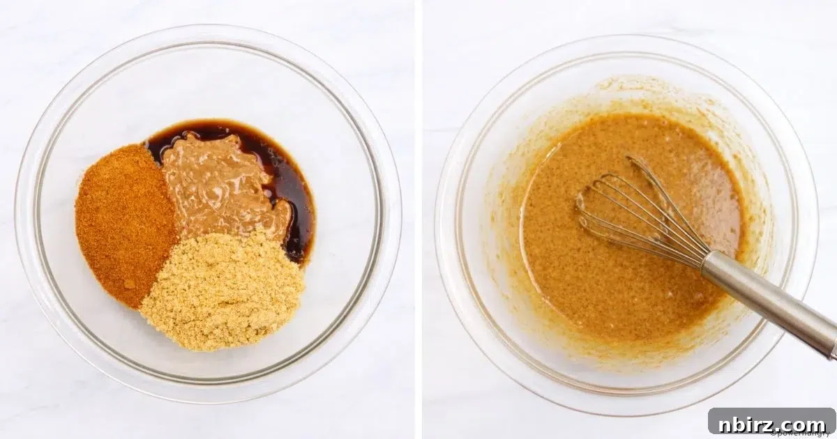 Close-up of wet ingredients being whisked in a bowl for vegan oat flour chocolate chip cookies, including almond butter, flaxseed meal, and vanilla extract.