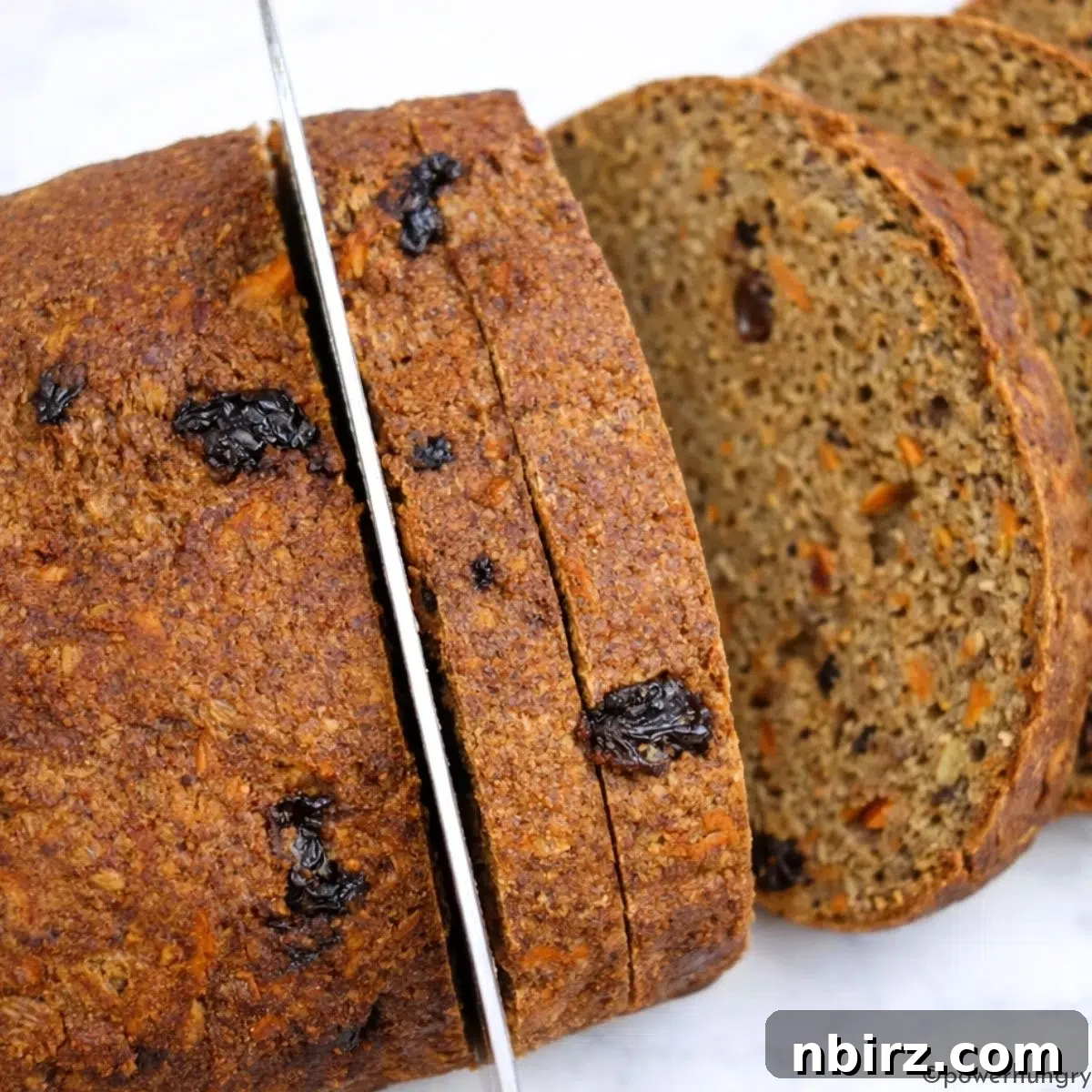 Guilt Free Carrot Cake Lentil Bread High Protein Vegan Grain Free 5 sliced carrot cake lentil bread on a cutting board