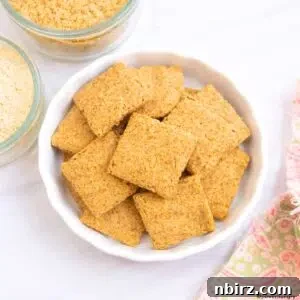 2-Ingredient Chickpea Flour Crackers in a white bowl, ready to be enjoyed