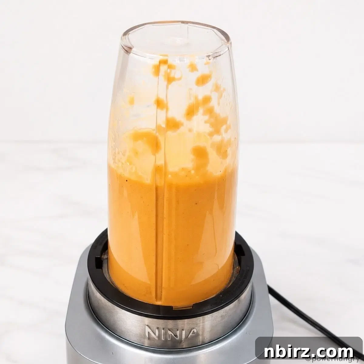 4-Ingredient High-Protein Vegan Red Lentil Pancakes 6 red lentil pancake batter in a blender