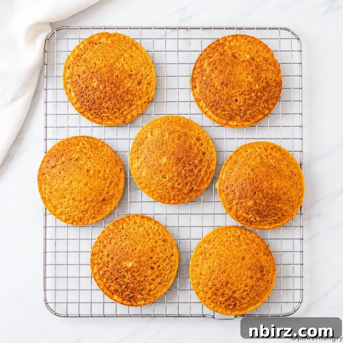 4-Ingredient High-Protein Vegan Red Lentil Pancakes 9 lentil pancakes on cooling rack