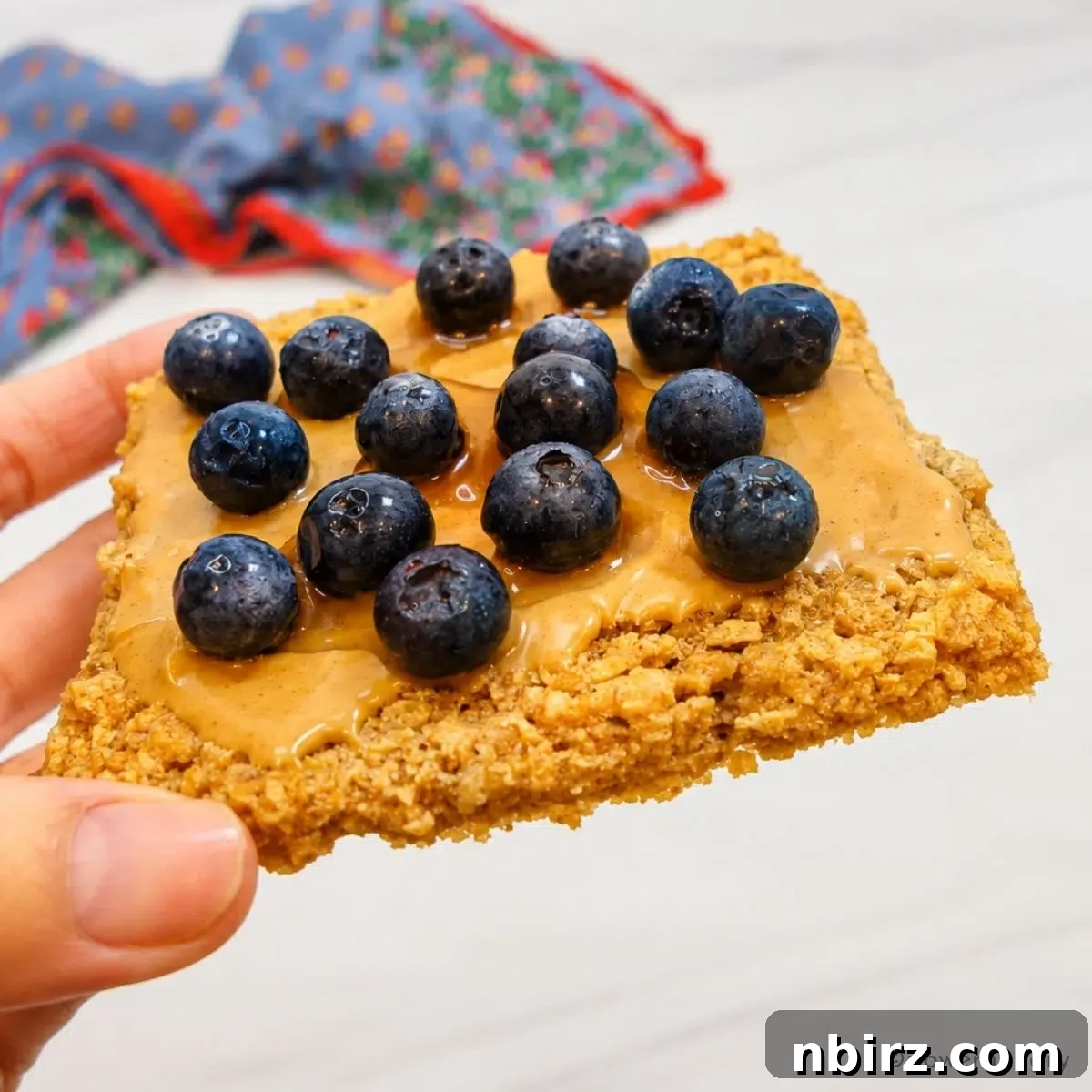5-Minute High-Protein Bread with 24g Protein 3 high protein bread slice with peanut butter and blueberries