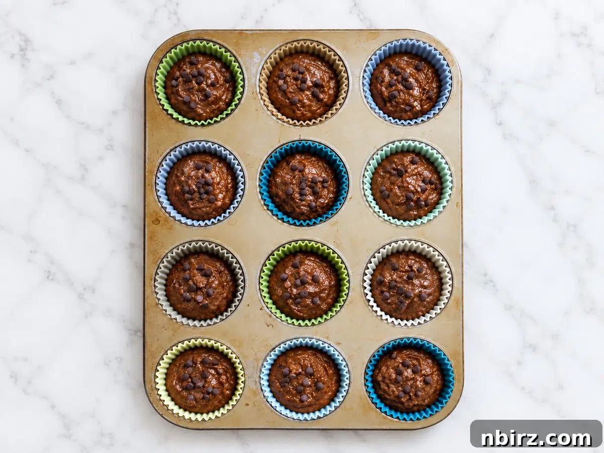 batter filled muffin cups for vegan chocolate buckwheat muffins